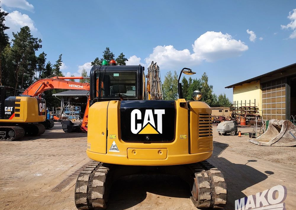 Caterpillar 308 E2CR - Lánctalpas kotró: 3 kép. Caterpillar 308 E2CR - Lánctalpas kotró: 3 kép.