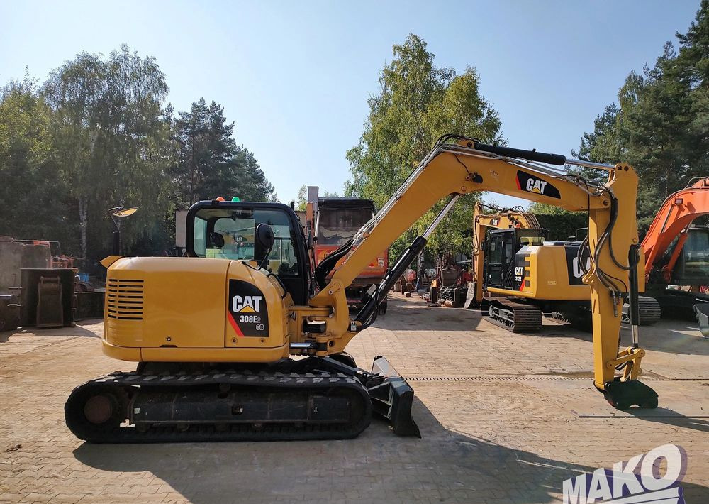 Caterpillar 308 E2CR - Lánctalpas kotró: 5 kép. Caterpillar 308 E2CR - Lánctalpas kotró: 5 kép.