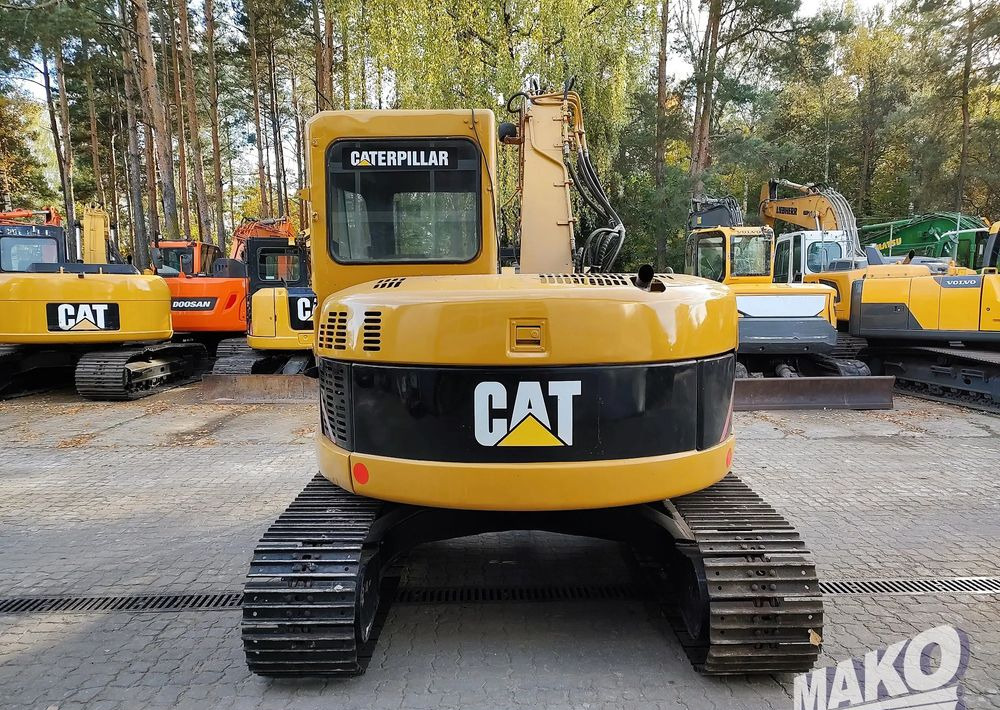 Caterpillar 308C - Lánctalpas kotró: 3 kép. Caterpillar 308C - Lánctalpas kotró: 3 kép.