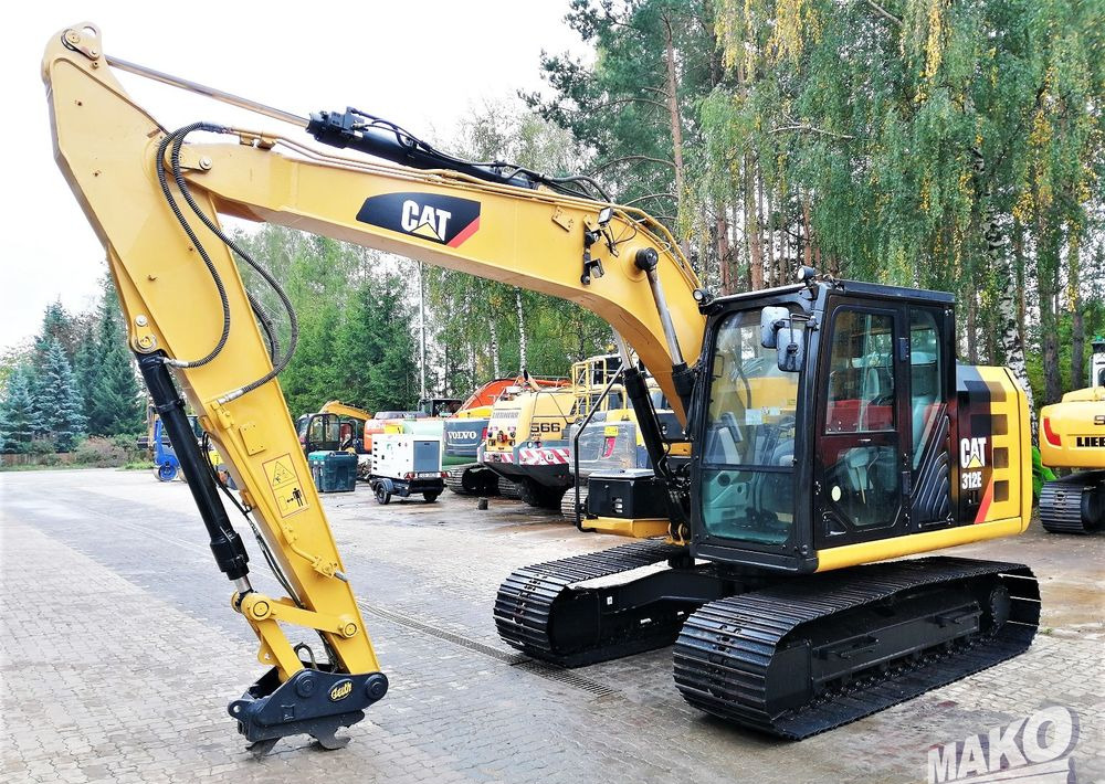 Caterpillar 312E - Lánctalpas kotró: 1 kép. Caterpillar 312E - Lánctalpas kotró: 1 kép.