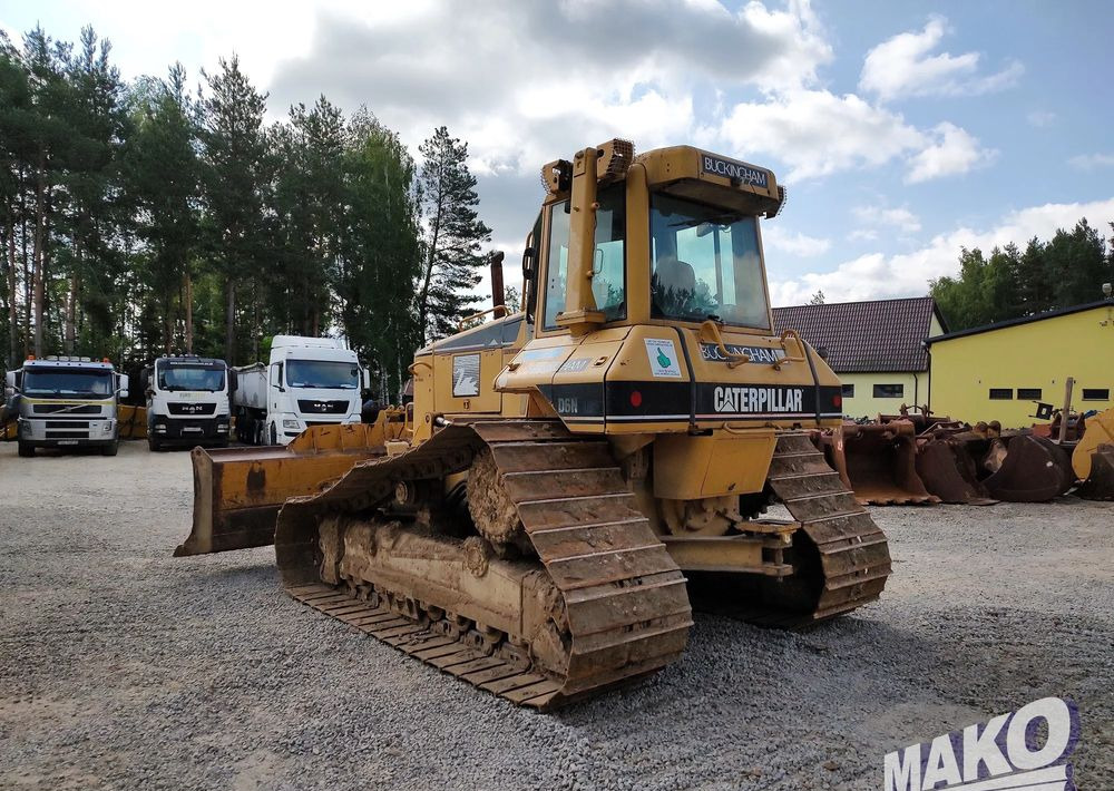 Caterpillar D6N LGP - Buldózer: 3 kép. Caterpillar D6N LGP - Buldózer: 3 kép.