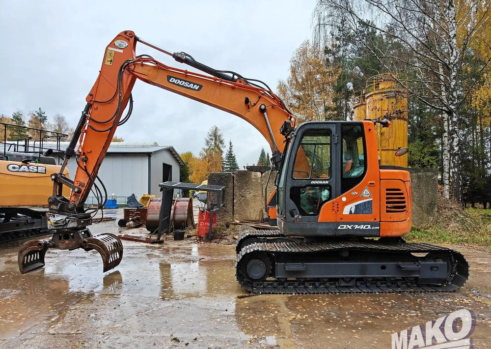 Doosan DX140LCR-5 - Lánctalpas kotró: 1 kép. Doosan DX140LCR-5 - Lánctalpas kotró: 1 kép.