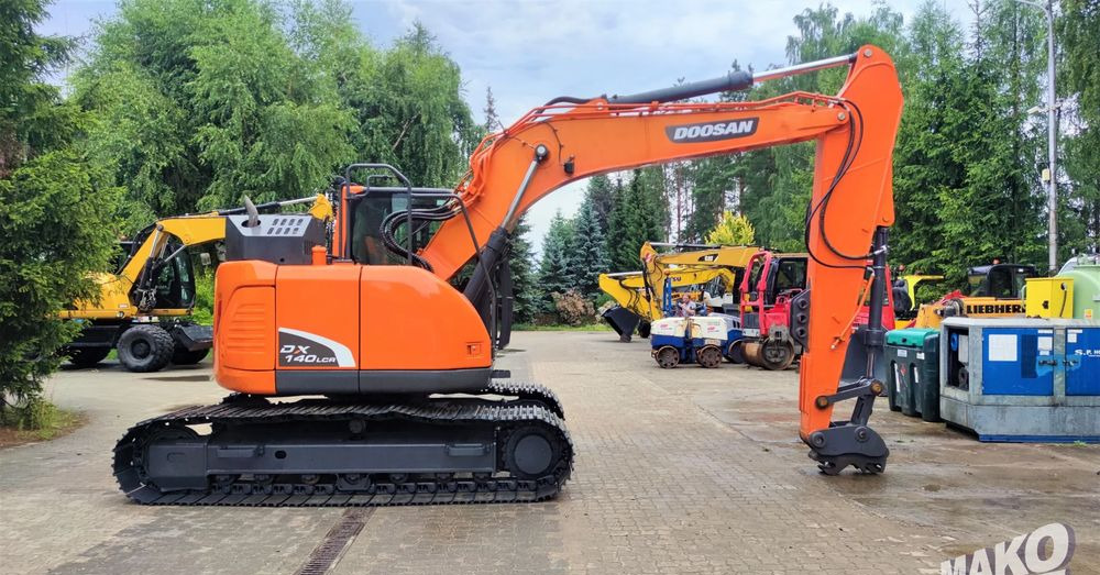 Doosan DX140LCR-5 - Lánctalpas kotró: 5 kép. Doosan DX140LCR-5 - Lánctalpas kotró: 5 kép.