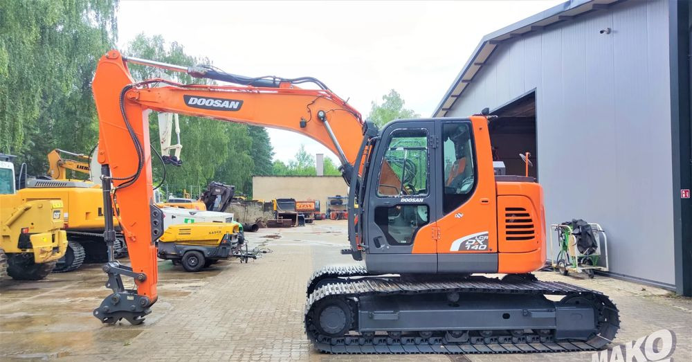 Doosan DX140LCR-5 - Lánctalpas kotró: 1 kép. Doosan DX140LCR-5 - Lánctalpas kotró: 1 kép.