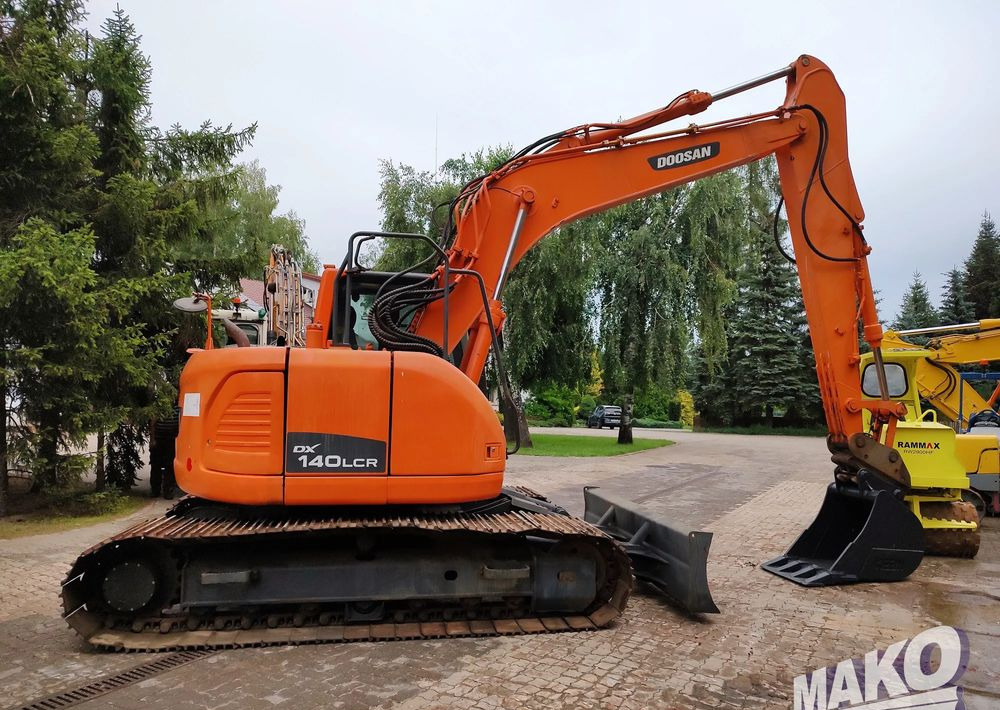 Doosan DX140LCR - Lánctalpas kotró: 5 kép. Doosan DX140LCR - Lánctalpas kotró: 5 kép.