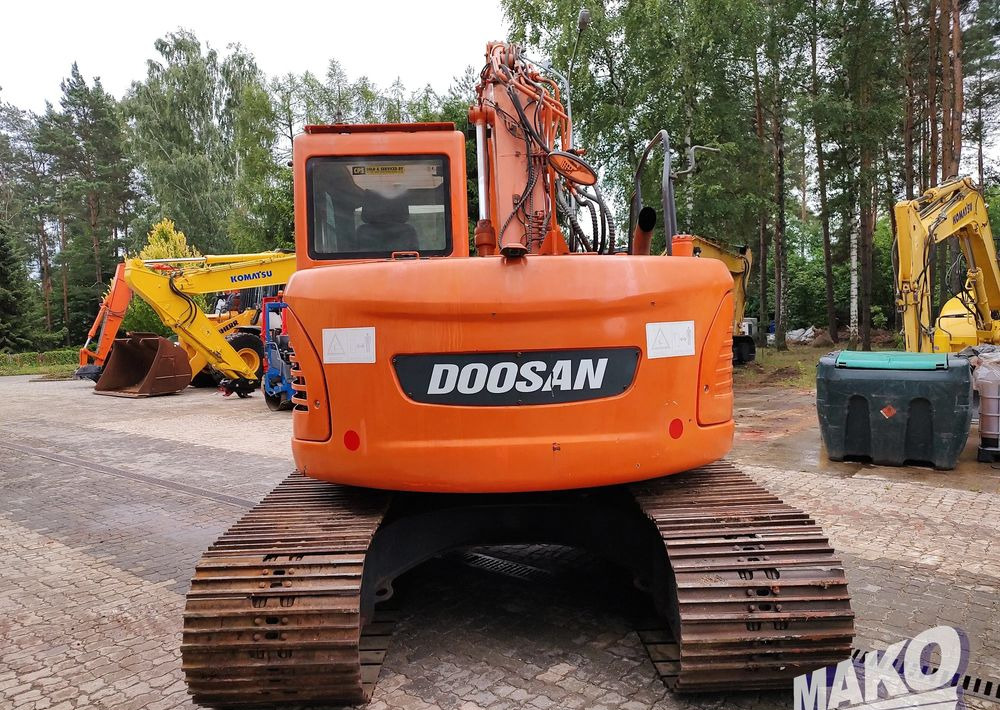 Doosan DX140LCR - Lánctalpas kotró: 3 kép. Doosan DX140LCR - Lánctalpas kotró: 3 kép.