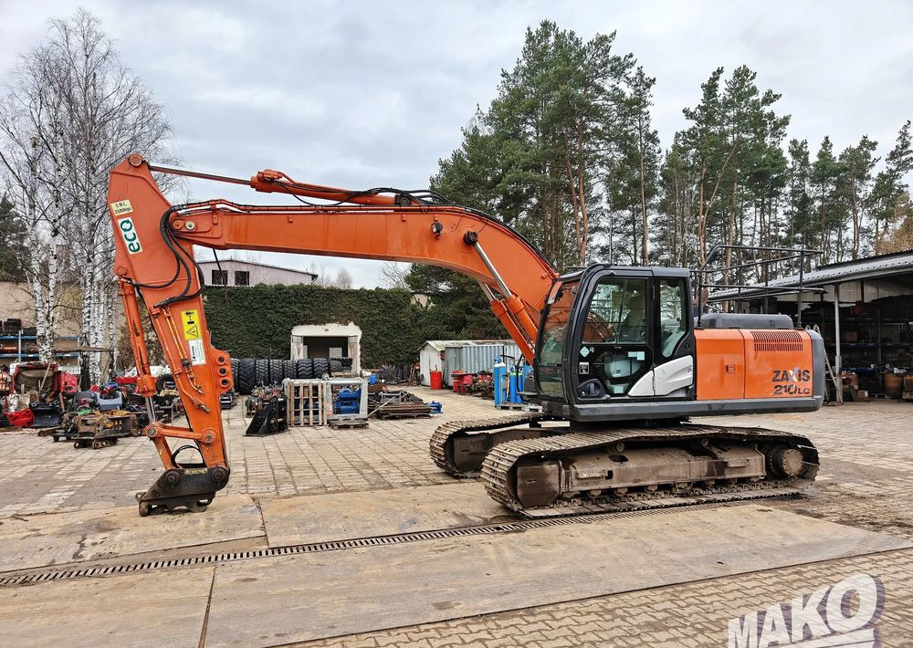 Hitachi ZX210LC-5B - Lánctalpas kotró: 1 kép. Hitachi ZX210LC-5B - Lánctalpas kotró: 1 kép.