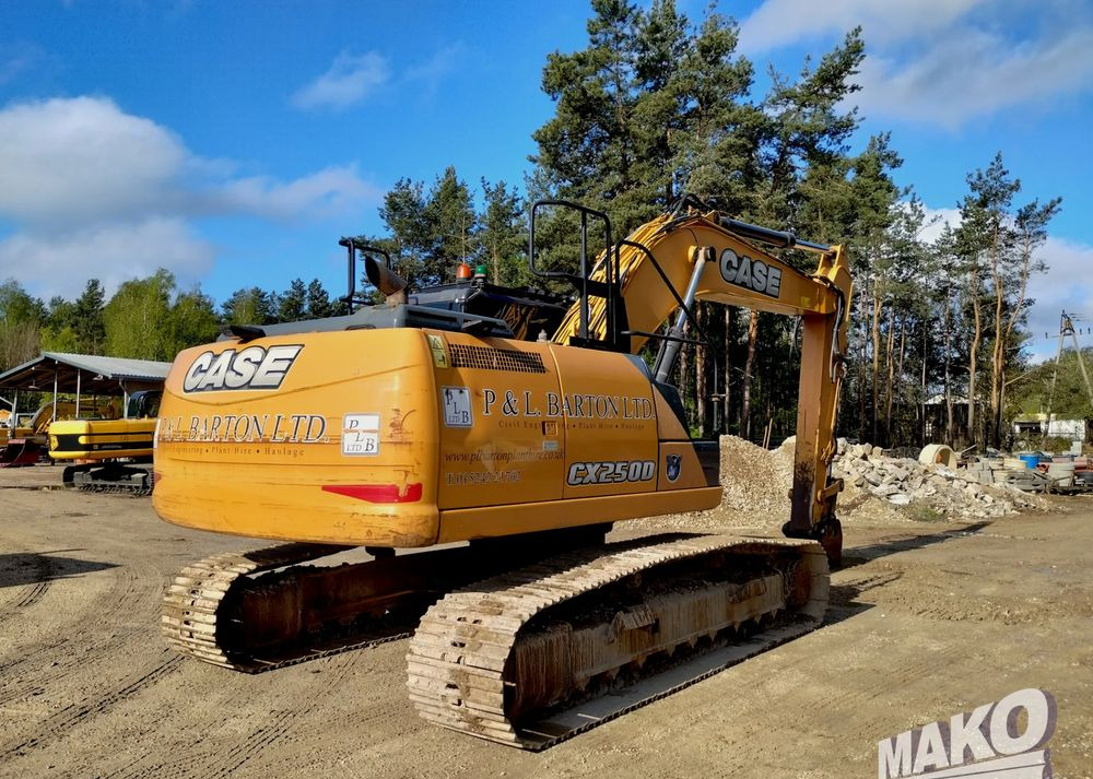 Komatsu CX 250 D - Lánctalpas kotró: 4 kép. Komatsu CX 250 D - Lánctalpas kotró: 4 kép.