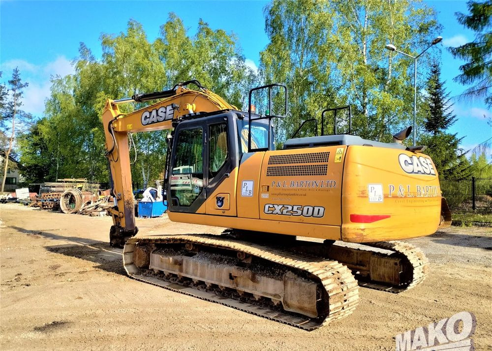 Komatsu CX 250 D - Lánctalpas kotró: 2 kép. Komatsu CX 250 D - Lánctalpas kotró: 2 kép.