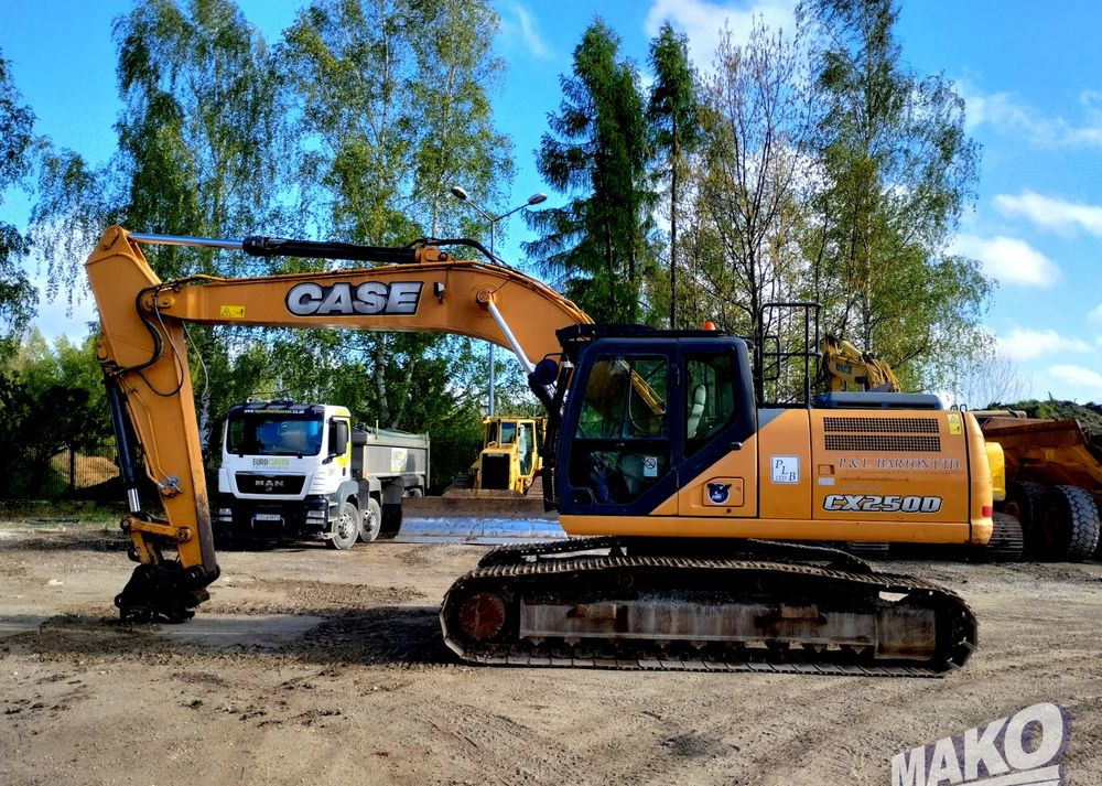 Komatsu CX 250 D - Lánctalpas kotró: 1 kép. Komatsu CX 250 D - Lánctalpas kotró: 1 kép.