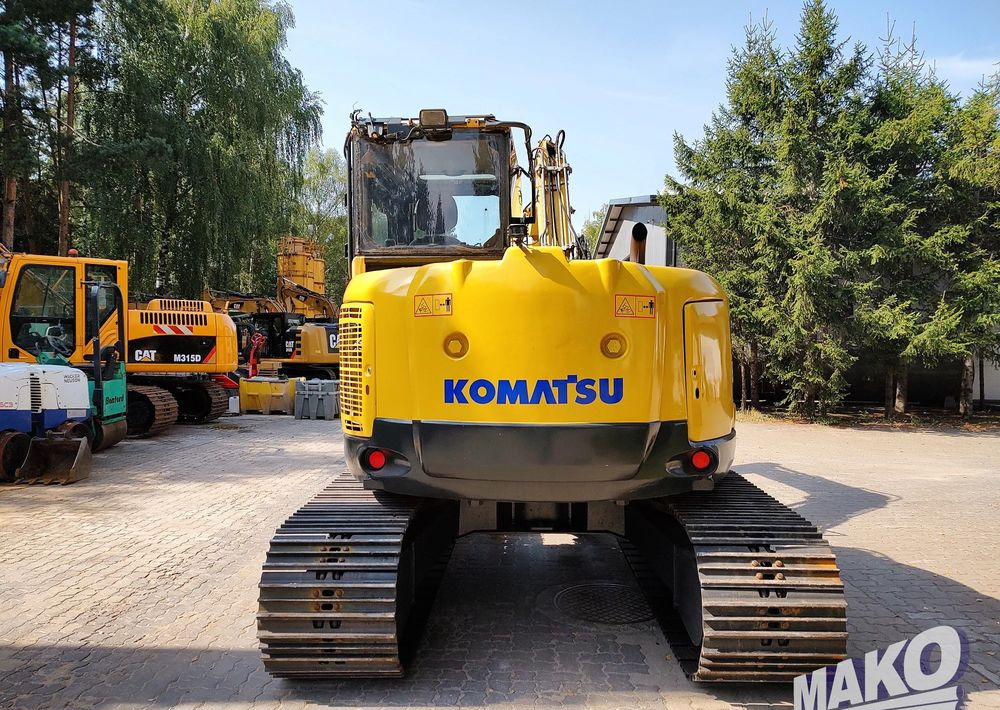 Komatsu PC118MR-8 - Lánctalpas kotró: 4 kép. Komatsu PC118MR-8 - Lánctalpas kotró: 4 kép.