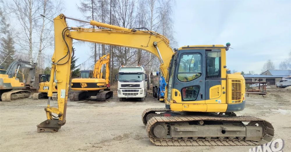 Komatsu PC138 US-8 - Lánctalpas kotró: 1 kép. Komatsu PC138 US-8 - Lánctalpas kotró: 1 kép.