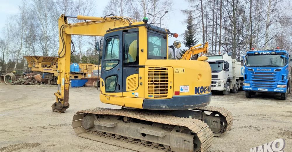 Komatsu PC138 US-8 - Lánctalpas kotró: 2 kép. Komatsu PC138 US-8 - Lánctalpas kotró: 2 kép.