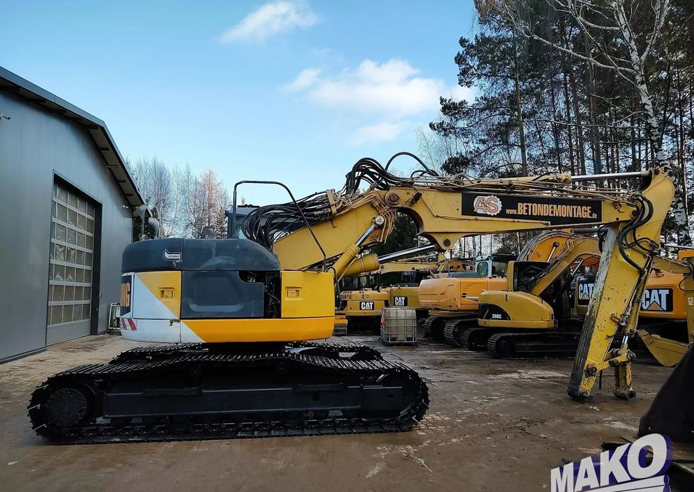 Komatsu PC228USLC-3 - Lánctalpas kotró: 5 kép. Komatsu PC228USLC-3 - Lánctalpas kotró: 5 kép.