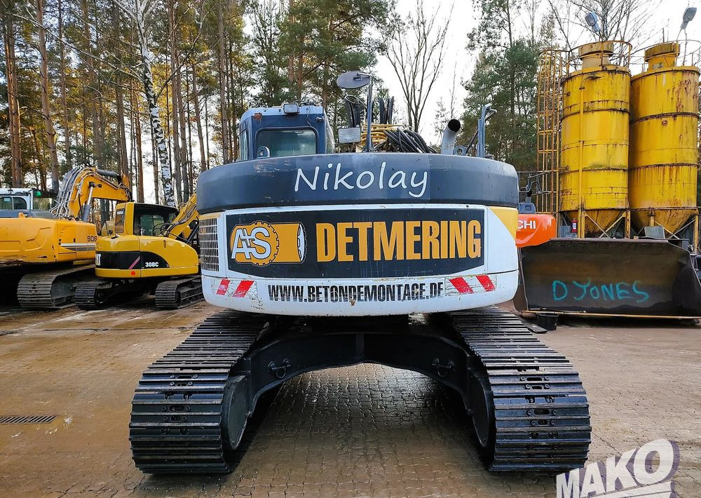 Komatsu PC228USLC-3 - Lánctalpas kotró: 3 kép. Komatsu PC228USLC-3 - Lánctalpas kotró: 3 kép.