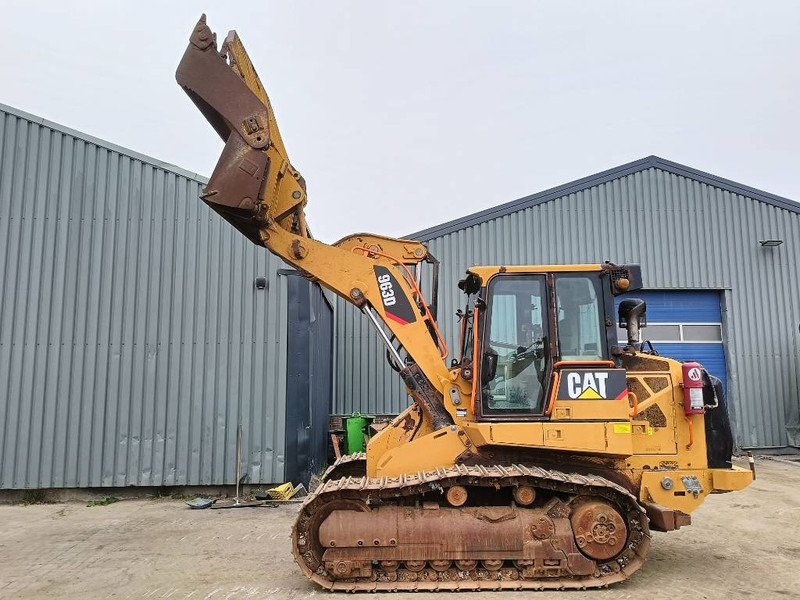 Cat 963 D crawler loader tracked rupslader raupen 20 t - Lánctalpas homlokrakodó: 3 kép. Cat 963 D crawler loader tracked rupslader raupen 20 t - Lánctalpas homlokrakodó: 3 kép.