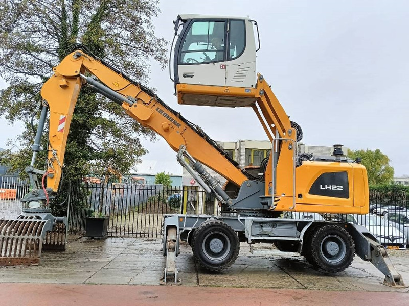 Liebherr LH 22 M overslagkraan wastehandler umslagbagger - Hulladék kotró: 2 kép. Liebherr LH 22 M overslagkraan wastehandler umslagbagger - Hulladék kotró: 2 kép.