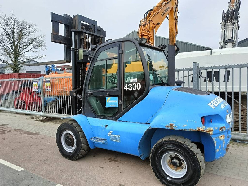 Manitou MI 70 H freelift ruw terrein 7 T heftruck forklift - Dízel targonca: 4 kép. Manitou MI 70 H freelift ruw terrein 7 T heftruck forklift - Dízel targonca: 4 kép.