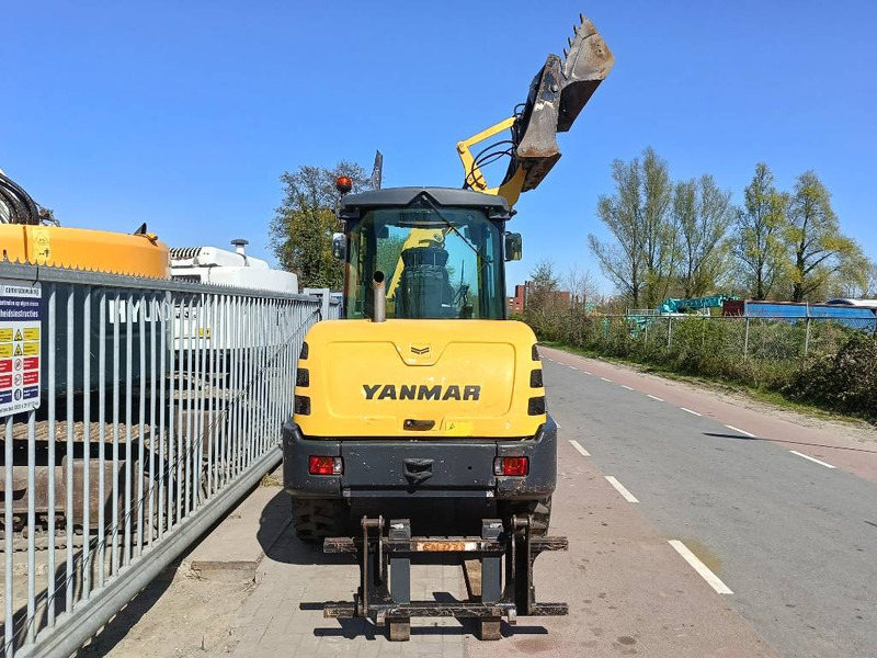 Yanmar V 70 S atlas AR75S shovel wiellader roterende mast - Gumikerekes homlokrakodó: 5 kép. Yanmar V 70 S atlas AR75S shovel wiellader roterende mast - Gumikerekes homlokrakodó: 5 kép.