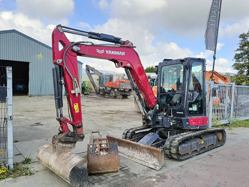 Yanmar Vio 50 -6b vio50 rupskraan excavator bagger track - Minikotró: 3 kép. Yanmar Vio 50 -6b vio50 rupskraan excavator bagger track - Minikotró: 3 kép.