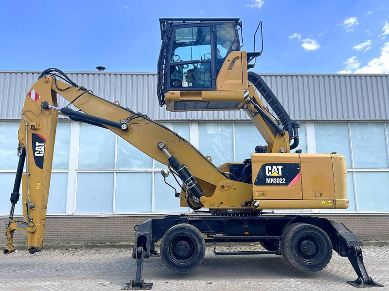 Cat MH 3022 2015 CE - Hulladék kotró: 1 kép. Cat MH 3022 2015 CE - Hulladék kotró: 1 kép.