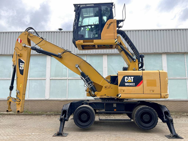 Cat MH3022 2015 CE - Hulladék kotró: 1 kép. Cat MH3022 2015 CE - Hulladék kotró: 1 kép.
