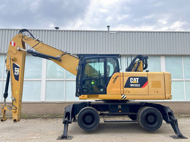 Cat MH3022 2015 CE - Hulladék kotró: 2 kép. Cat MH3022 2015 CE - Hulladék kotró: 2 kép.