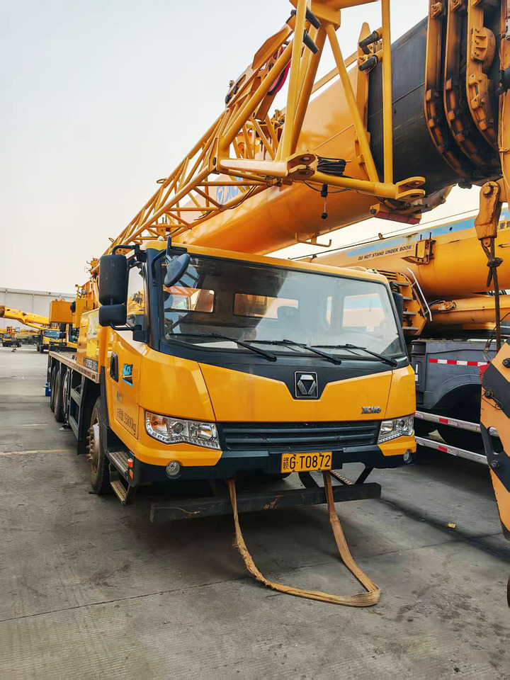 XCMG Official Used 25 Ton Truck Crane QY25K5D-5 Small Mobile Crane Price List - Autódaru: 2 kép. XCMG Official Used 25 Ton Truck Crane QY25K5D-5 Small Mobile Crane Price List - Autódaru: 2 kép.