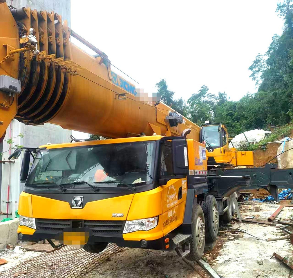 XCMG QY95K7C 95ton used truck crane mobile price - Autódaru: 4 kép. XCMG QY95K7C 95ton used truck crane mobile price - Autódaru: 4 kép.