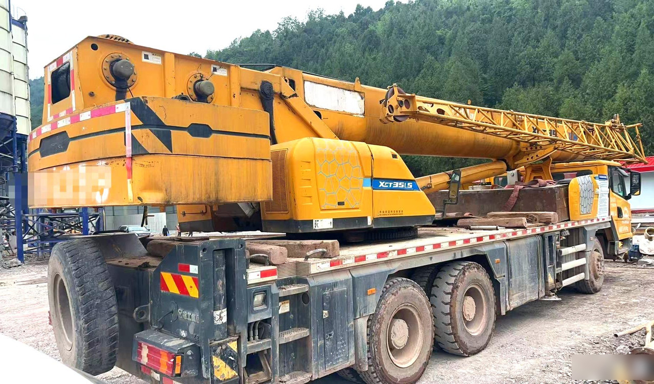 XCMG XCT20L5 20ton used telescopic arm hydraulic truck crane price - Autódaru: 5 kép. XCMG XCT20L5 20ton used telescopic arm hydraulic truck crane price - Autódaru: 5 kép.