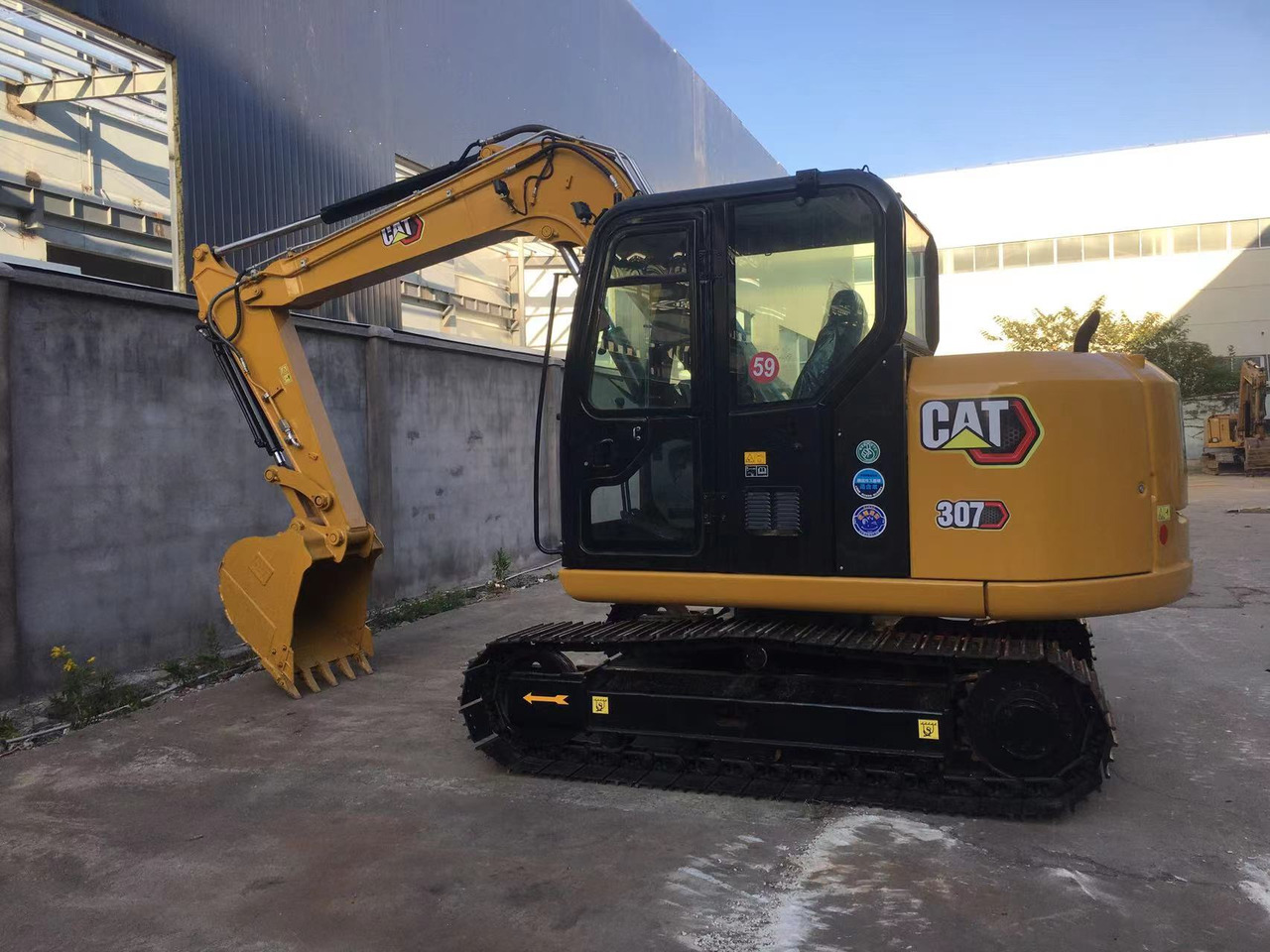 Caterpillar Small Digger CAT 307E2, 306E2 - Lánctalpas kotró: 2 kép. Caterpillar Small Digger CAT 307E2, 306E2 - Lánctalpas kotró: 2 kép.