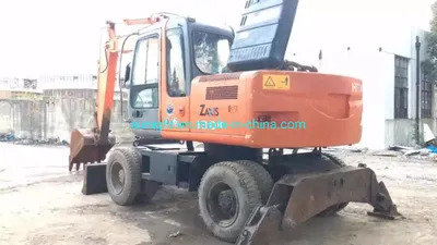 Good Price Slightly Used Japanese Wheel Excavator Hitachi Zx130W Moving by Tyres for Sale - Gumikerekes kotró: 1 kép. Good Price Slightly Used Japanese Wheel Excavator Hitachi Zx130W Moving by Tyres for Sale - Gumikerekes kotró: 1 kép.