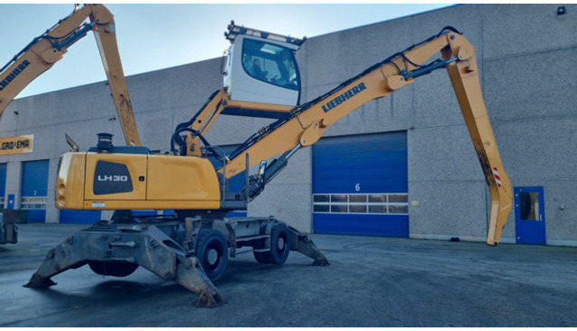 Liebherr LH30 M - Hulladék kotró: 5 kép. Liebherr LH30 M - Hulladék kotró: 5 kép.
