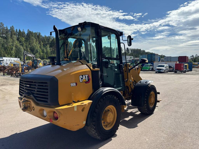 Cat 906 - Gumikerekes homlokrakodó: 3 kép. Cat 906 - Gumikerekes homlokrakodó: 3 kép.