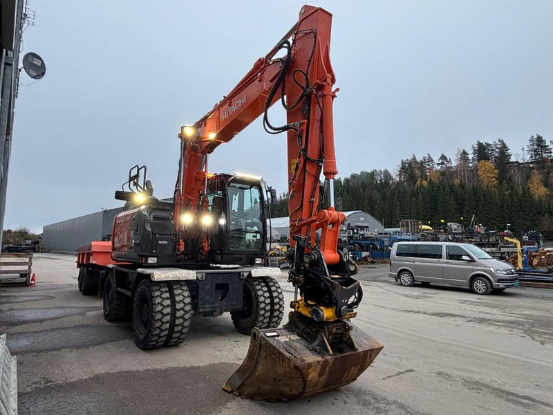 Hitachi ZX 145 W-6 - Gumikerekes kotró: 4 kép. Hitachi ZX 145 W-6 - Gumikerekes kotró: 4 kép.