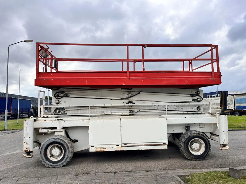 Holland lift COMBISTAR M-250DL27 4WD/P/N - Ollós emelő: 2 kép. Holland lift COMBISTAR M-250DL27 4WD/P/N - Ollós emelő: 2 kép.
