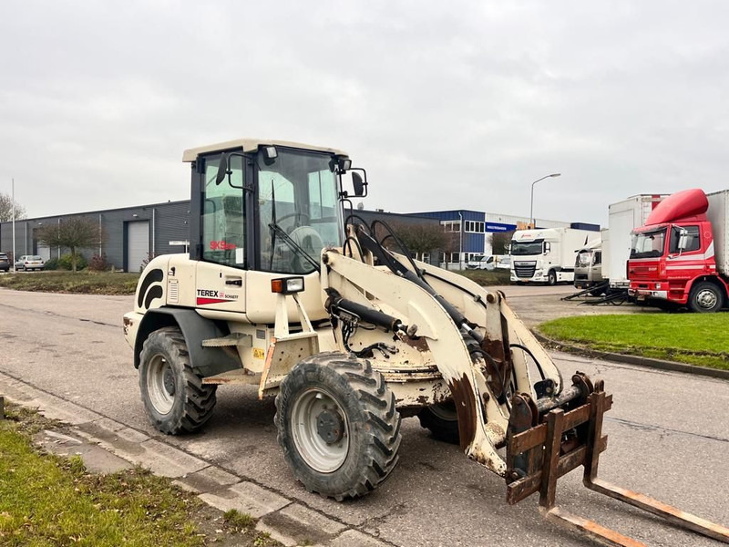 Schaeff Terex SKS 634 - Gumikerekes homlokrakodó: 3 kép. Schaeff Terex SKS 634 - Gumikerekes homlokrakodó: 3 kép.