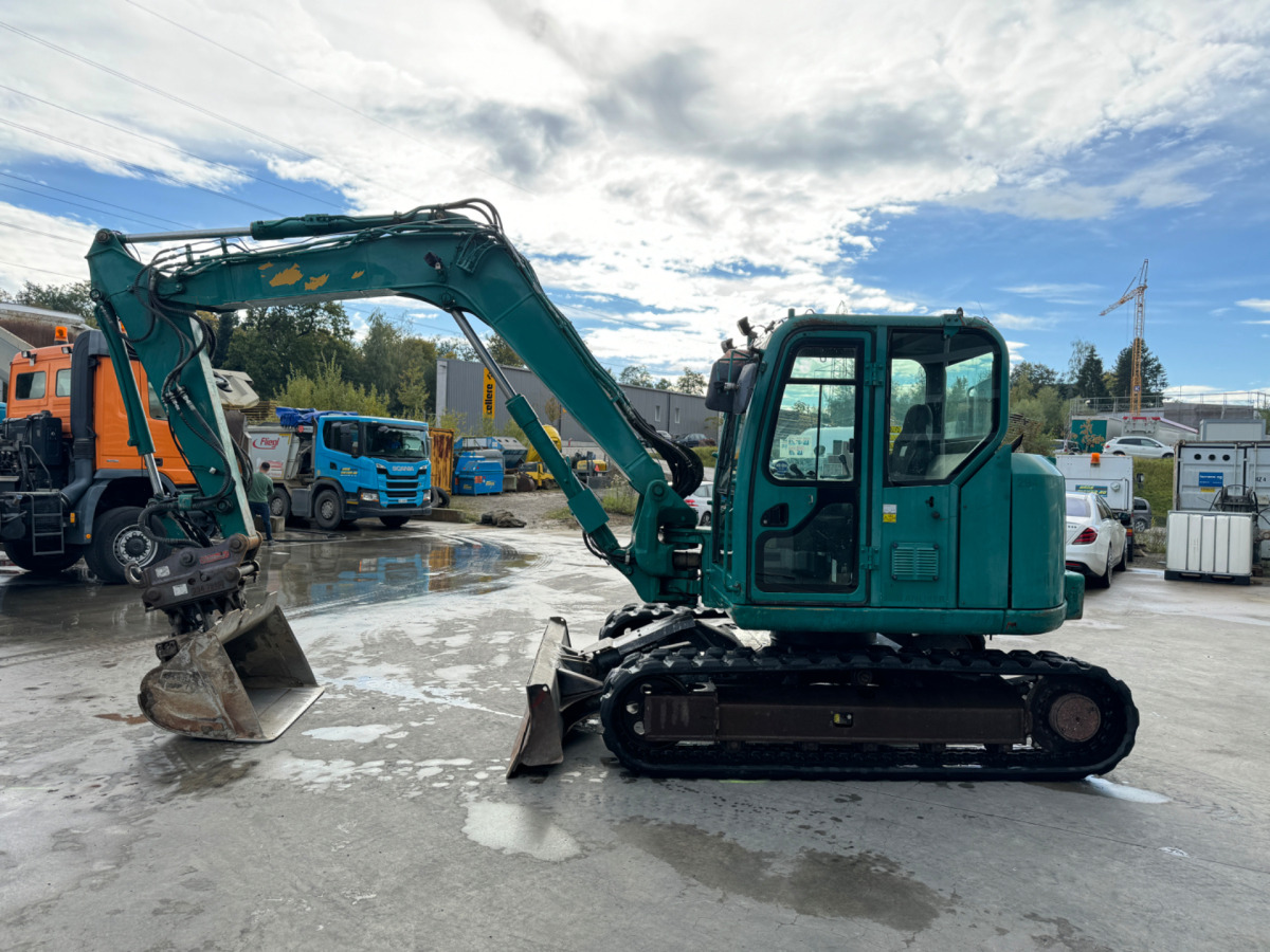 CATERPILLAR 308E2CR Oilquick 3x Schaufeln - Lánctalpas kotró: 1 kép. CATERPILLAR 308E2CR Oilquick 3x Schaufeln - Lánctalpas kotró: 1 kép.
