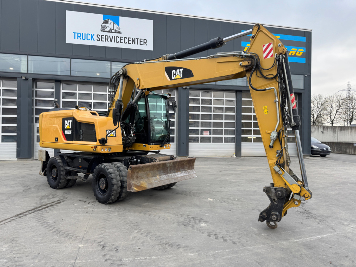 CATERPILLAR M320F Oilquick - Gumikerekes kotró: 2 kép. CATERPILLAR M320F Oilquick - Gumikerekes kotró: 2 kép.