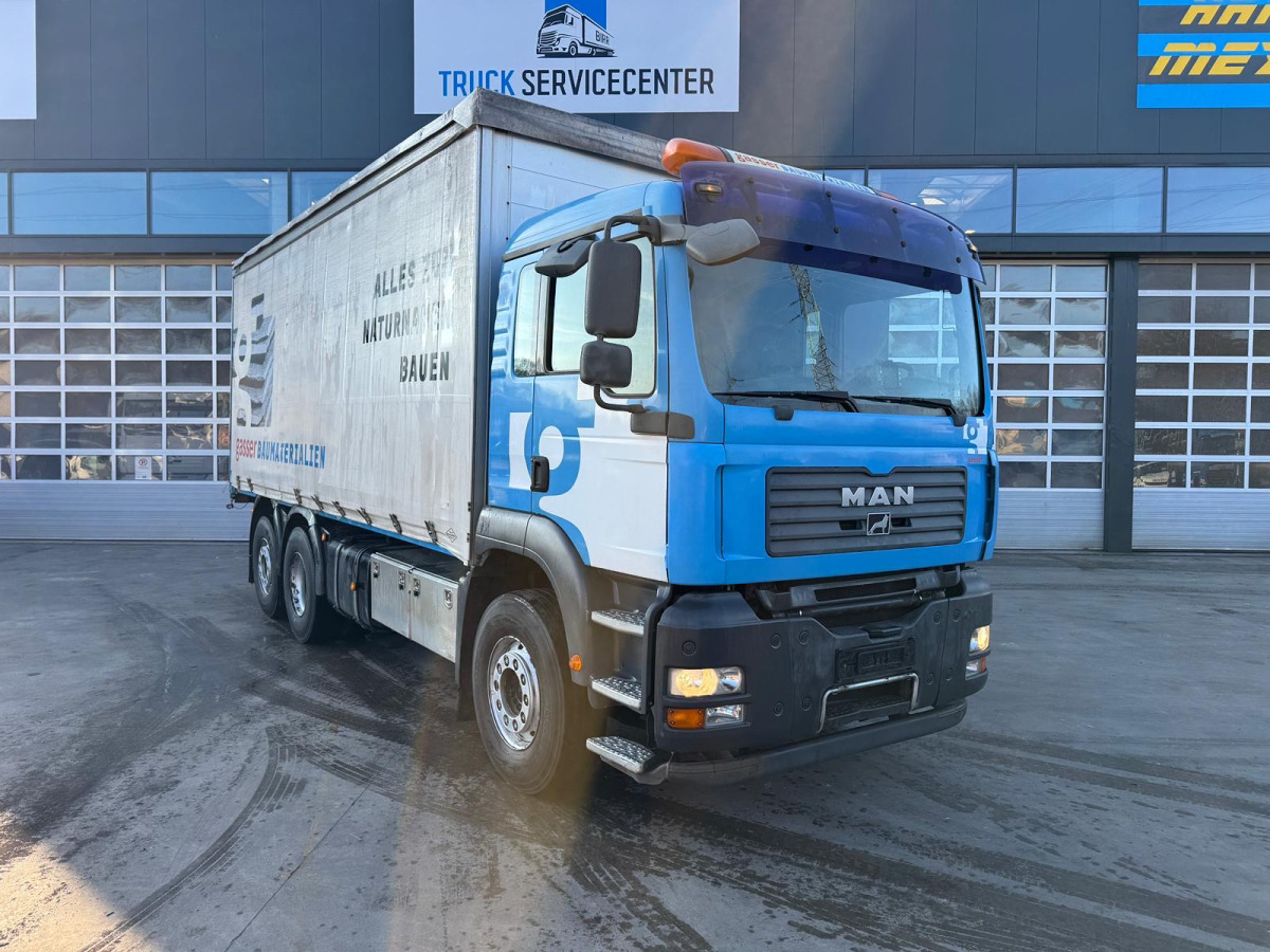 MAN TGA 26.440 6x2 - Ponyvás teherautó: 3 kép. MAN TGA 26.440 6x2 - Ponyvás teherautó: 3 kép.