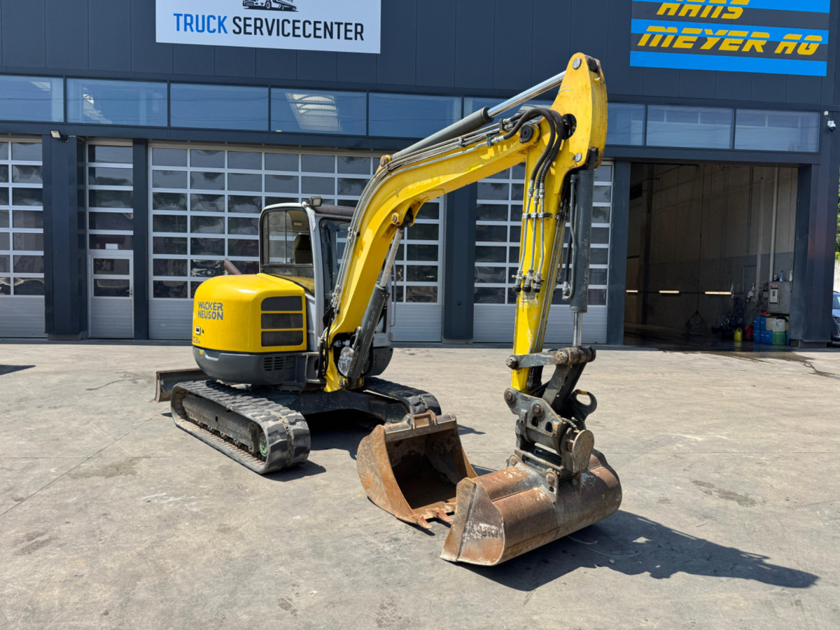 NEUSON 6003 - Lánctalpas kotró: 2 kép. NEUSON 6003 - Lánctalpas kotró: 2 kép.