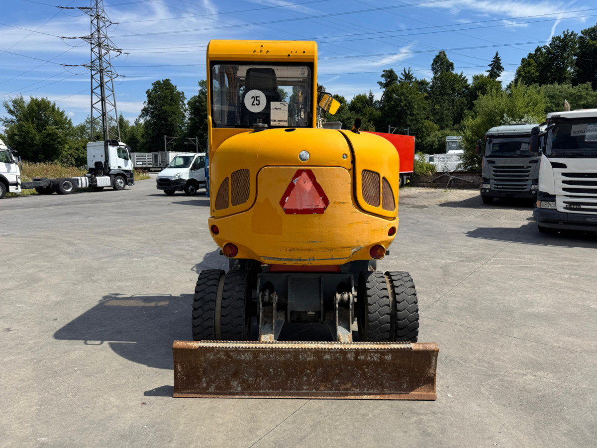 NEUSON 6503 4x Schaufeln - Gumikerekes kotró: 5 kép. NEUSON 6503 4x Schaufeln - Gumikerekes kotró: 5 kép.