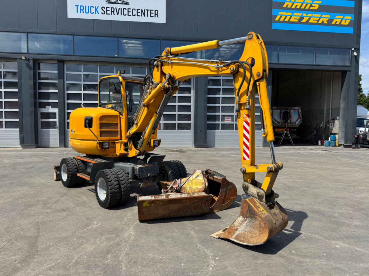 NEUSON 6503 4x Schaufeln - Gumikerekes kotró: 2 kép. NEUSON 6503 4x Schaufeln - Gumikerekes kotró: 2 kép.