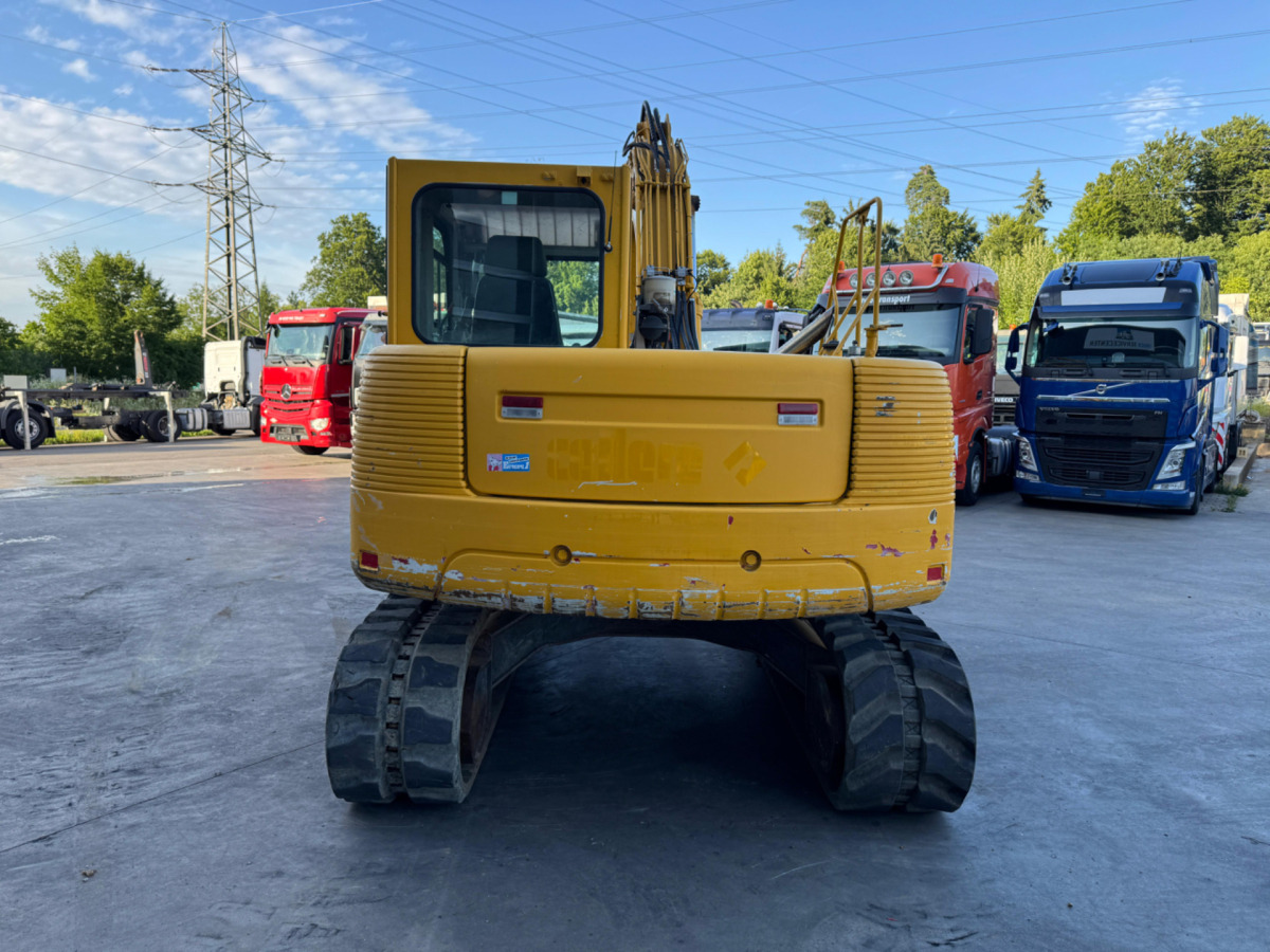 TAKEUCHI TB1140 Powertilt - Lánctalpas kotró: 5 kép. TAKEUCHI TB1140 Powertilt - Lánctalpas kotró: 5 kép.