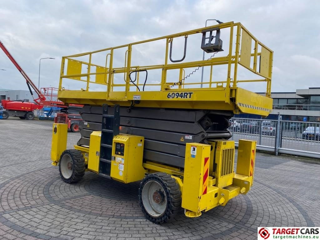 GMG 6094RT Diesel 4x4 Scissor Work Lift 2020cm - Ollós emelő: 2 kép. GMG 6094RT Diesel 4x4 Scissor Work Lift 2020cm - Ollós emelő: 2 kép.