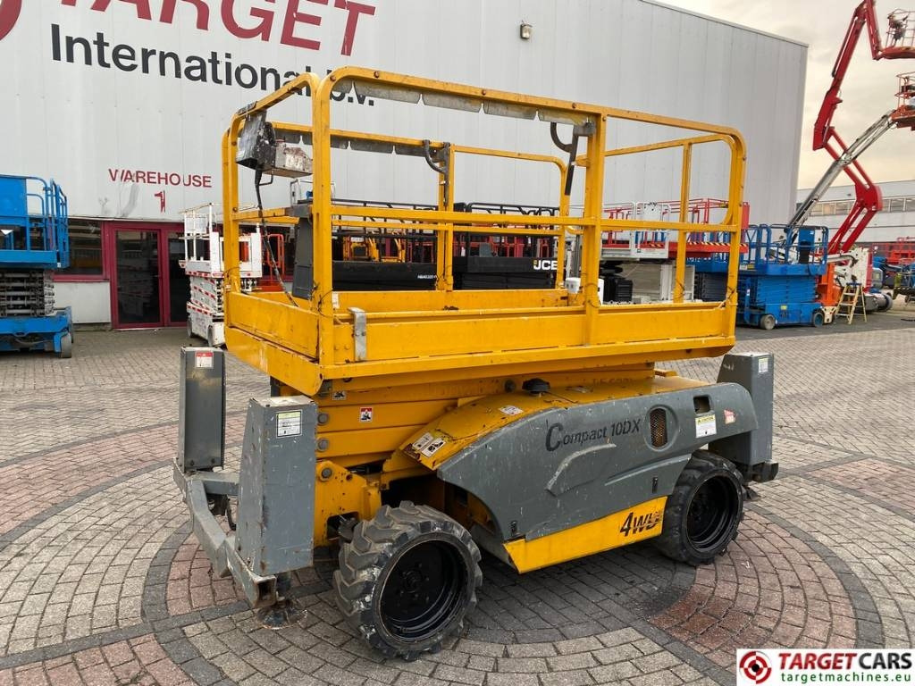 Haulotte Compact 10DX Diesel 4x4 Scissor Work Lift 1015cm - Ollós emelő: 1 kép. Haulotte Compact 10DX Diesel 4x4 Scissor Work Lift 1015cm - Ollós emelő: 1 kép.