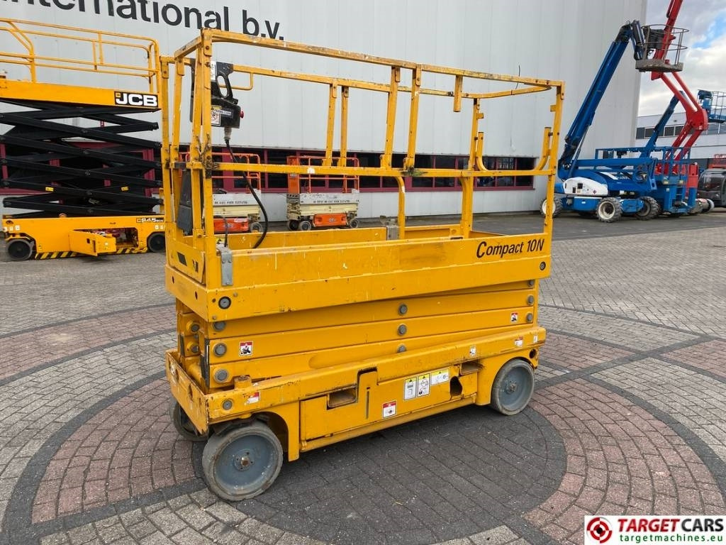 Haulotte Compact 10N Electric Scissor Work Lift 1000cm - Ollós emelő: 1 kép. Haulotte Compact 10N Electric Scissor Work Lift 1000cm - Ollós emelő: 1 kép.