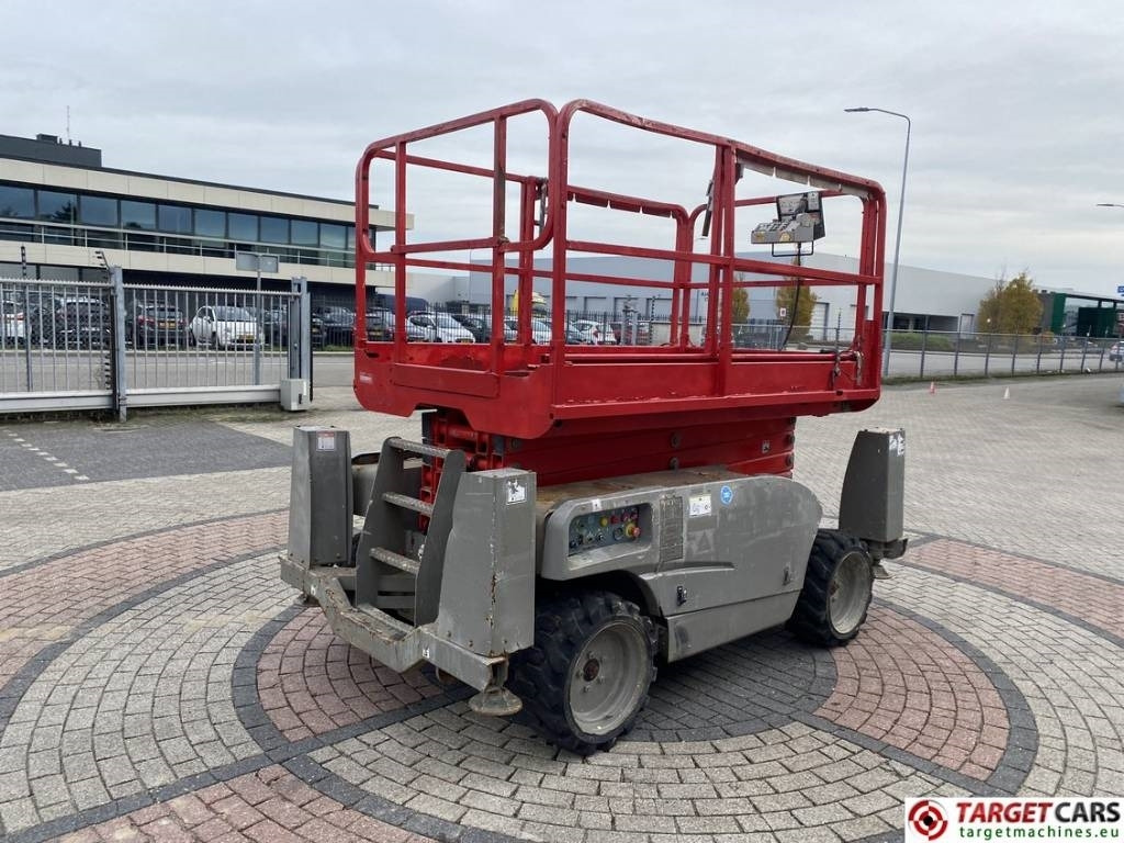 Haulotte Compact 12DX Diesel 4x4 Scissor Work Lift 1206cm - Ollós emelő: 3 kép. Haulotte Compact 12DX Diesel 4x4 Scissor Work Lift 1206cm - Ollós emelő: 3 kép.