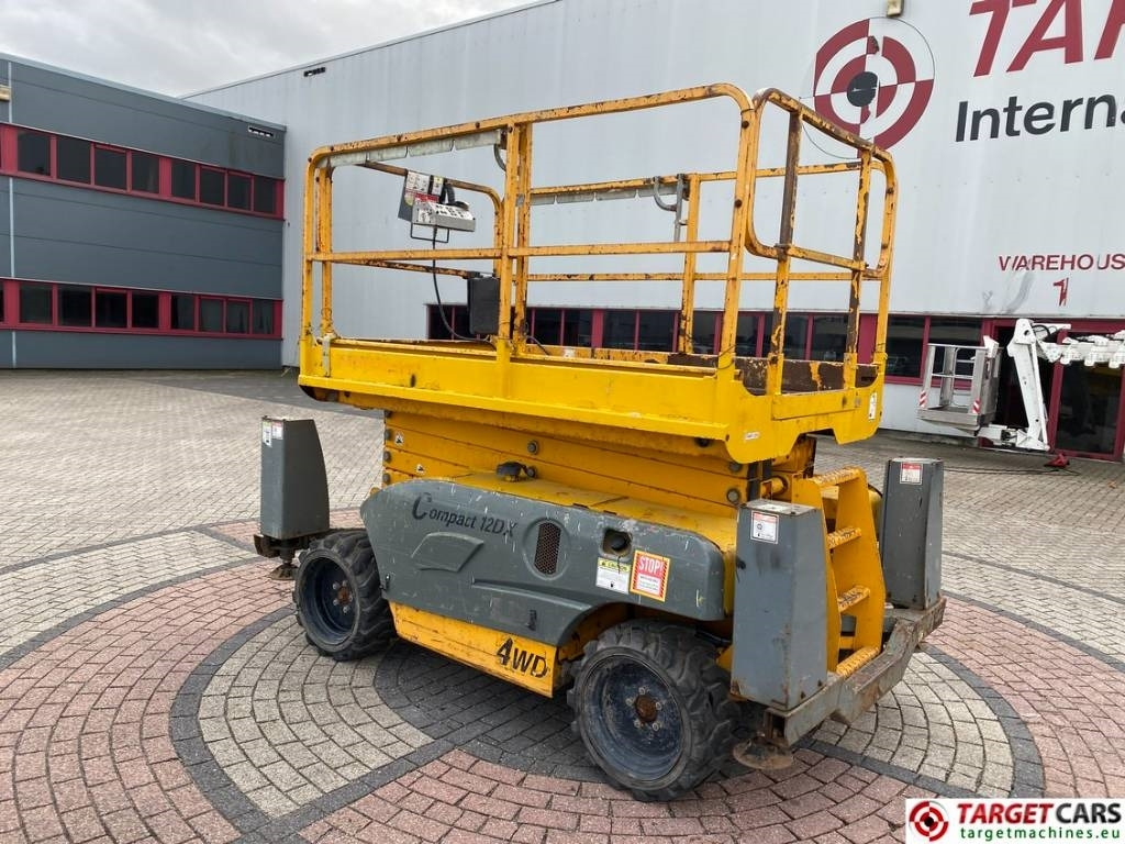 Haulotte Compact 12DX Diesel 4x4 Scissor Work Lift 1206cm - Ollós emelő: 4 kép. Haulotte Compact 12DX Diesel 4x4 Scissor Work Lift 1206cm - Ollós emelő: 4 kép.