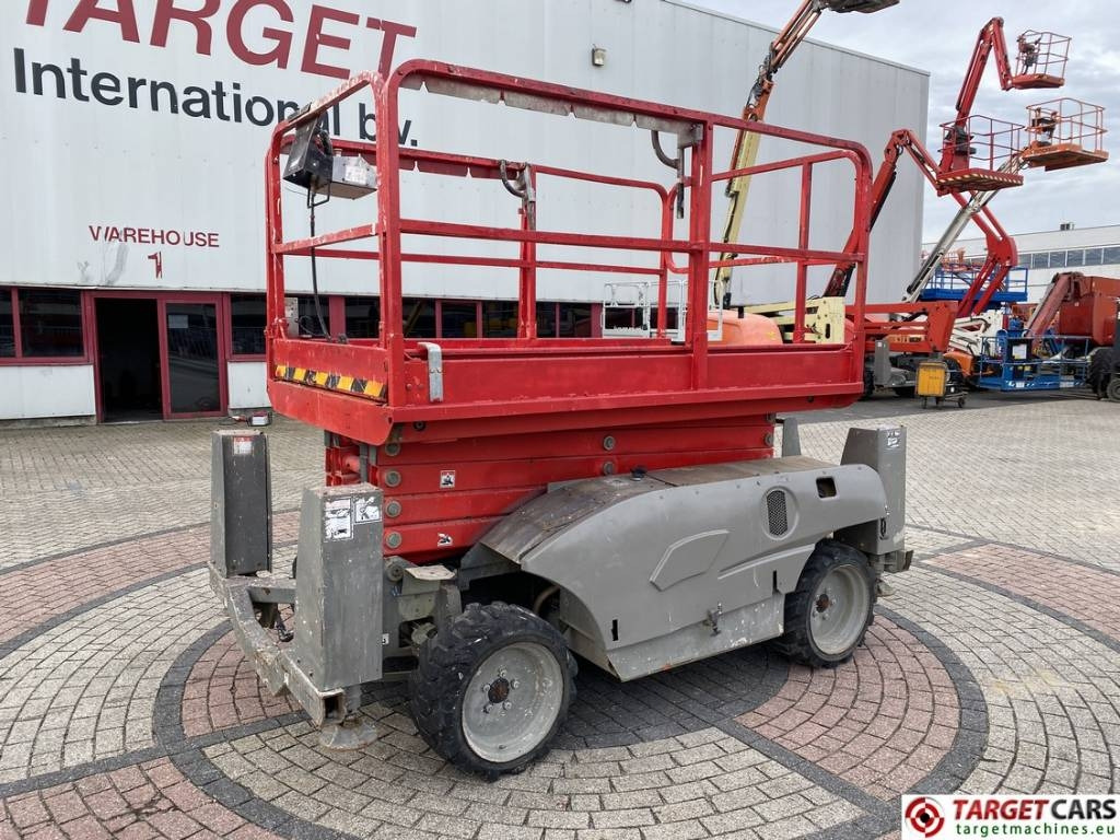 Haulotte Compact 12DX Diesel 4x4 Scissor Work Lift 1206cm - Ollós emelő: 1 kép. Haulotte Compact 12DX Diesel 4x4 Scissor Work Lift 1206cm - Ollós emelő: 1 kép.